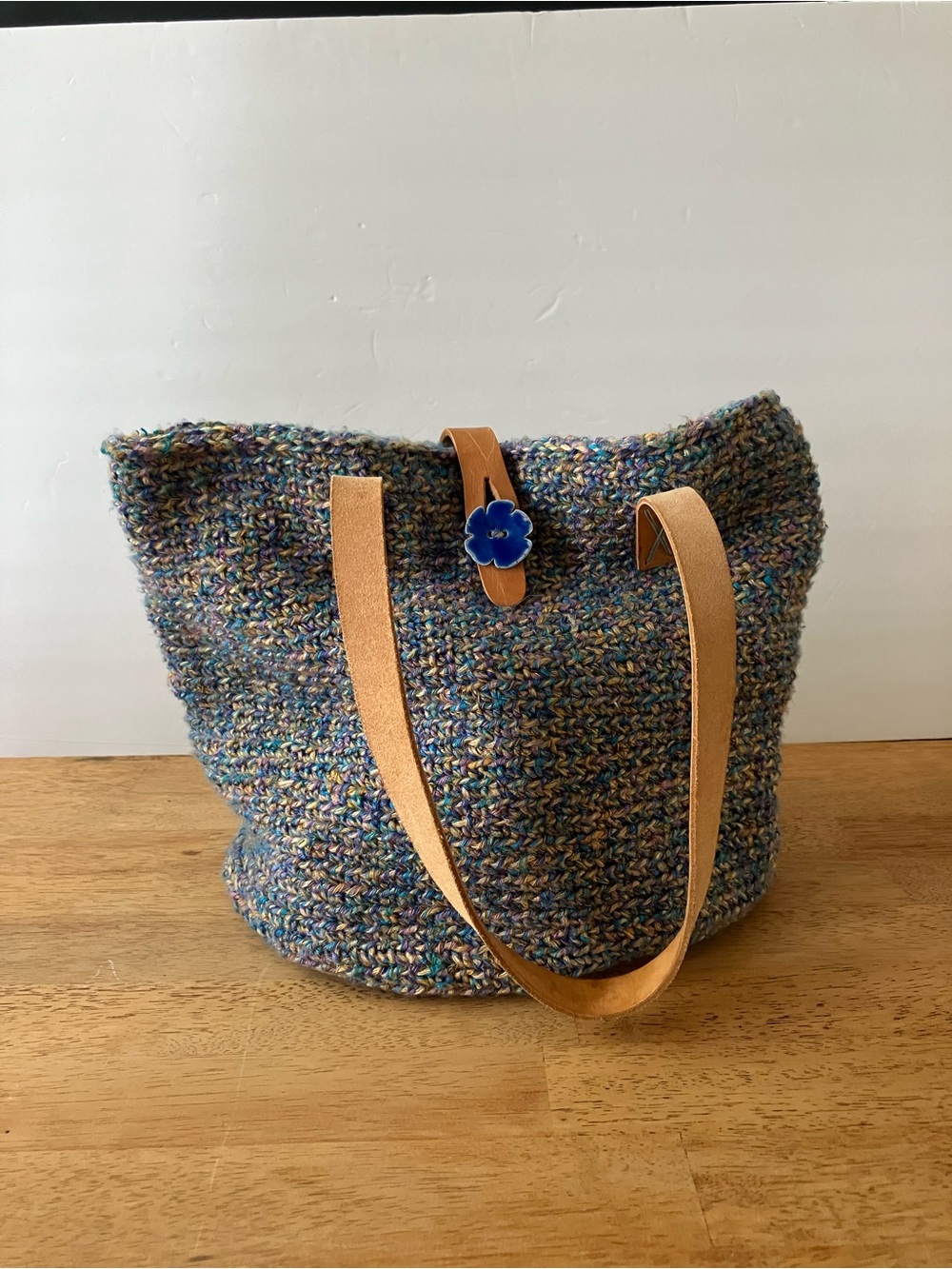 Multicolor Knit Tote with Tan Leather Straps and Blue Flower Accent